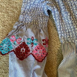 off the shoulder blue and floral long sleeve shirt